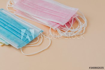 Surgical mask collectio on a beige background