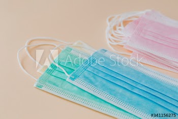 Surgical mask collectio on a beige background