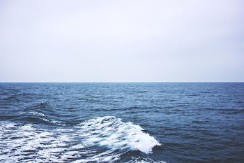 surging wave on sea
