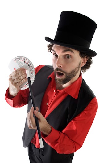 surprised magician doing a trick of letters