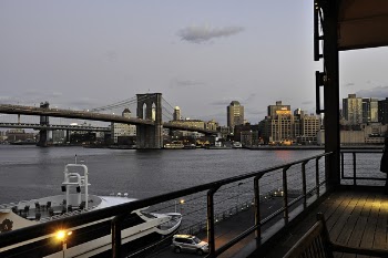 Suspension Bridge Near City Buildings