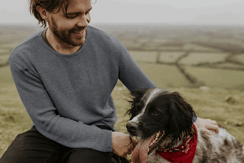 Sweatshirt mockup, man with dog | Free PSD Mockup - rawpixel