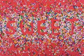 Sweet Written In Candy Sprinkles