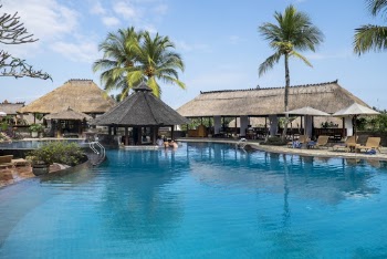 Swimming Pool Beside Cottages