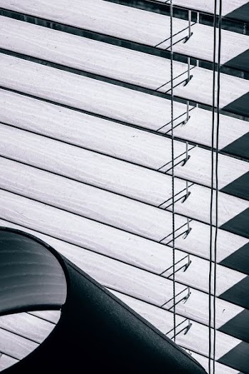 table lamp shade near window blinds