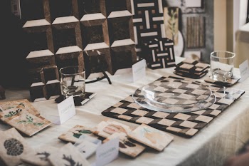 Table With Clear Glass Plates and Glass