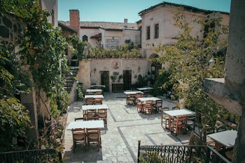 Tables and Chairs Outside a Restaurant