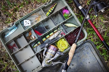 Tackle Box With Fishing Lures and Rods