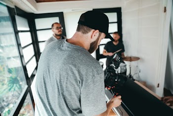 Taking Photo Of A Man Playing Instrument