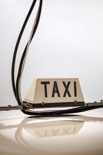 Taxi signage in shallow focus lens