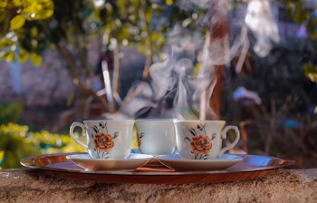 Teacups And Saucers On A Tray