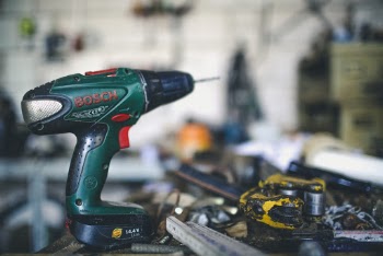 Teal and Black Bosch Cordless Hand Drill