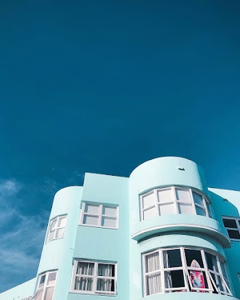 Teal Concrete Building during Day