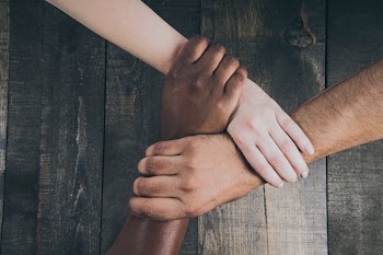 Team Hands Linked Together