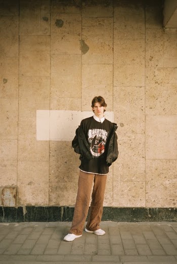 Teenage Boy in Casual Outfit Standing in Street · Free Stock Photo