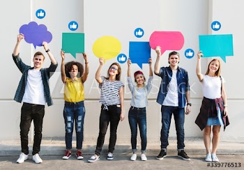 Teens holding text boxes
