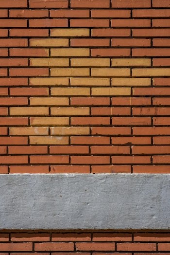 Textured Red Brick Wall