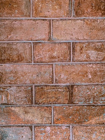 Textured Red Brick Wall Background