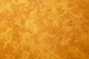Textured Warm Ochre Plaster Wall