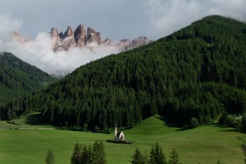 The amazing view of the San Giovanni in Ranui Church with the Odle Mountains in the background.