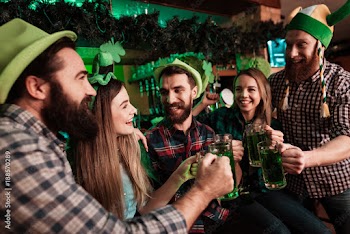The company of young people celebrate St. Patrick's Day.