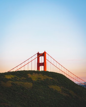 The Golden Gate Bridge peeking through Battery Spencer.