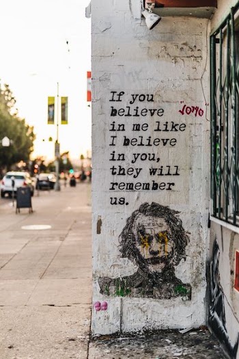 the joker quote painted on wall