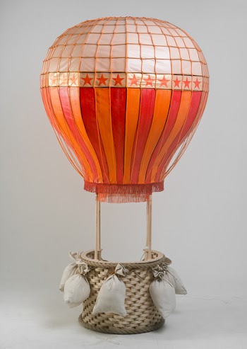 The model of hot air balloon with wicker basket for children game....