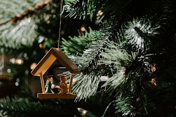 The Nativity of Christ-themed wooden Christmas ornament
