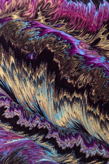The project was supposed to be something outer space/galaxy. It turned out to look like feathers or fins ;)