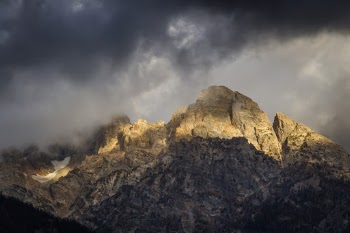 The weather was inclement most of the time while I was in Grand Teton NP, but occasionally the sun would break thru like this.     To learn how to take pictures like this, read my educational blogs at www.sharetimsphotos.com.