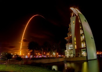This is a 151-second exposure of a SpaceX Falcon 9 delivering 60 Starlink satellites to orbit on the evening of May 23, 2019. Shot near the 7-story Exploration Tower, the streak and the tower have a nice mirror symmetry. I would love to say that I planned this. I was heading to another spot about 3 miles west to photograph the launch and the new owners had a chain across the road and ominous "No Trespassing" signs, so I had to choose another spot to set up with about 15 minutes to go.
