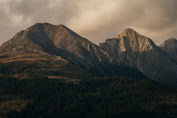 This photo was shot from a place quite remote to the public, especially at the time it was shot. Almost no post processing was necessary. It has a special place for me because I hiked both mountains and stayed at the mountain it was shot from.
Everyone tells me how it should be the next Apple default desktop which makes it even more special to me on how people see the image.
