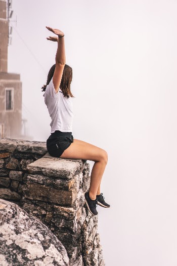 This picture was taken after a long and intense hike up Table Mountain. We pushed ourselves so hard we were so excited just to sit down and relax up in the clouds. This picture makes me feel a sense of accomplishment.
