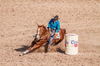 This strong woman competed in the barrel race at the Tucson Rodeo, working powerfully with her horse teammate to navigate around barrels at top speed.

International Women’s Day