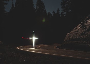 This was a long exposure I did where my friend drew a cross with a flashlight. The shutter was set to about 10 seconds. 