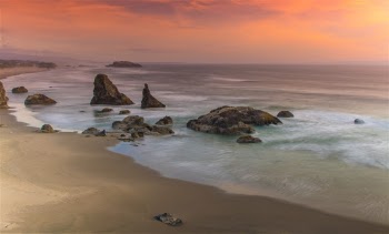 This was taken from an overlooking bluff at Bandon, Or. at sunset.     To learn how to take pictures like this, read my educational blogs at www.sharetimsphotos.com.