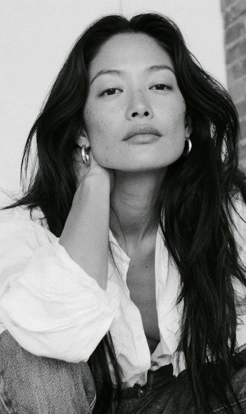 Thoughtful Chinese Designer in Black and White