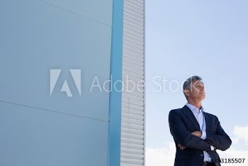 Thoughtful corporate businessman