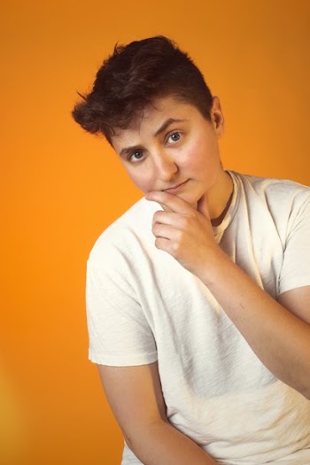 Thoughtful Person In White Tshirt Portrait