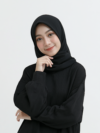 Thoughtful Young Southeast Asian Woman in Black Hijab