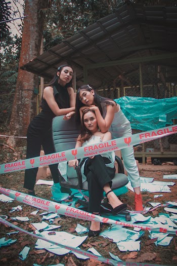 Three Asian Women Doing A Photoshoot