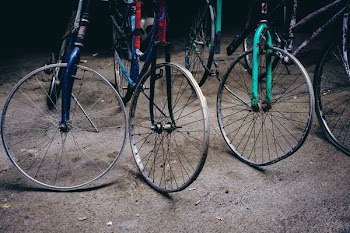 three bicycle without tires