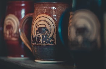 Three Brown Beer Mugs
