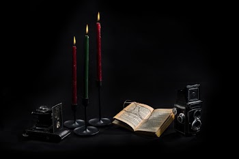 Three Candlesticks Books And Cameras