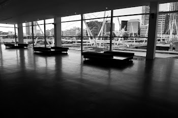 Three Couches in Hallway in Grayscale Photography