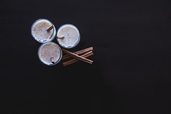 Three Egg Nogs And Some Cinnamon Sticks
