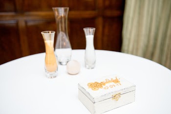 Three Glass Vases on White Table