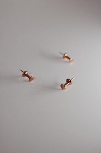 Three Gold Tacks