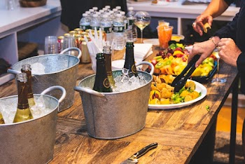 Three Gray Ice Buckets on Table